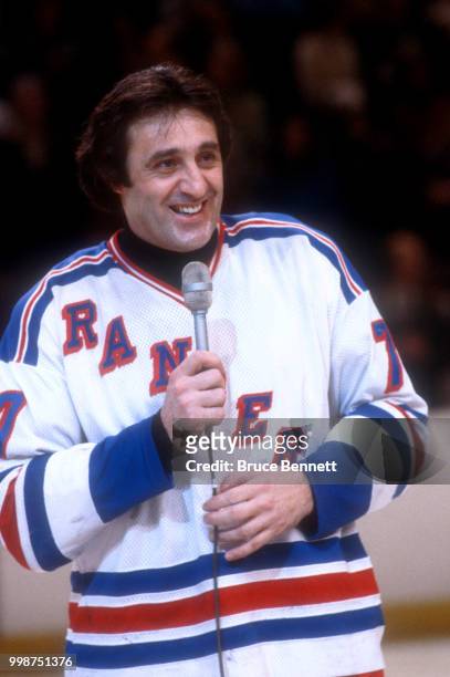 Phil Esposito of the New York Rangers talks to the crowd as he retires after an NHL game against the Buffalo Sabres on January 9, 1981 at the Madison...
