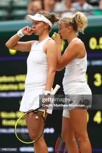 Barbora Krejcikova and Katerina Siniakova of Czech Republic discuss tactics during the Ladies' Doubles final against Nicole Melichar of The United...