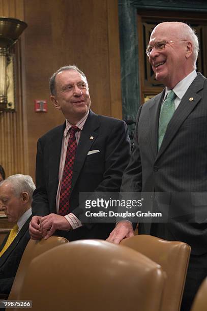 Arlen Specter, R-PA., and Patrick Leahy, D-VT., talk before the start of the Senate Judiciary Committee full committee markup to vote on the...