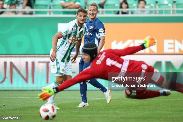 Maximillian Hofmann of Rapid, Lewis Holtby of Hamburger SV and Richard Strebinger of Rapid during the Pre Season Friendly match between SK Rapid and...