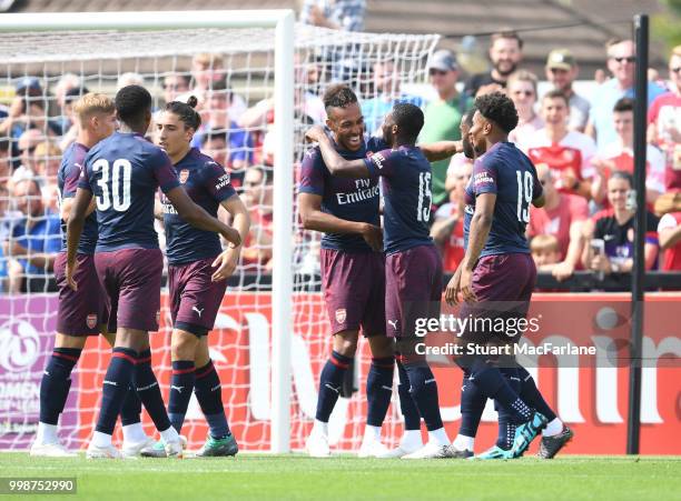 Pierre-Emerick Aubameyang celebrates scoring his 3rd goal with Alex Lacazette during the pre-season friendly between Boreham Wood and Arsenal at...