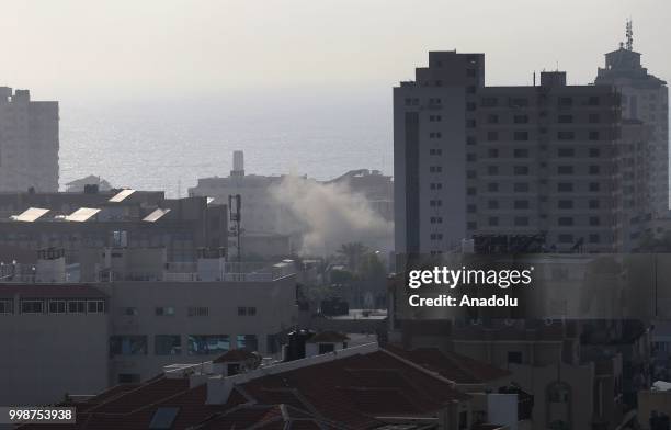 Smoke rises after Israeli fighter jets pounded a building in Al Katiba region in Gaza City, Gaza on July 14, 2018.