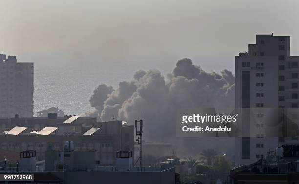 Smoke rises after Israeli fighter jets pounded a building in Al Katiba region in Gaza City, Gaza on July 14, 2018.