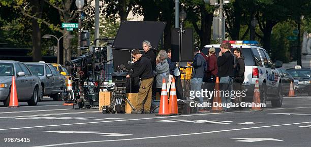 Friday's commuter traffic was greeted to a feature film crew working in the middle of Constitution Ave. Just west of the U.S. Capitol October 2,...