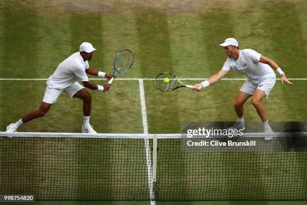 Raven Klaasen of South Africa and Michael Venus of New Zealand return against Mike Bryan and Jack Sock of The United States during the Men's Doubles...