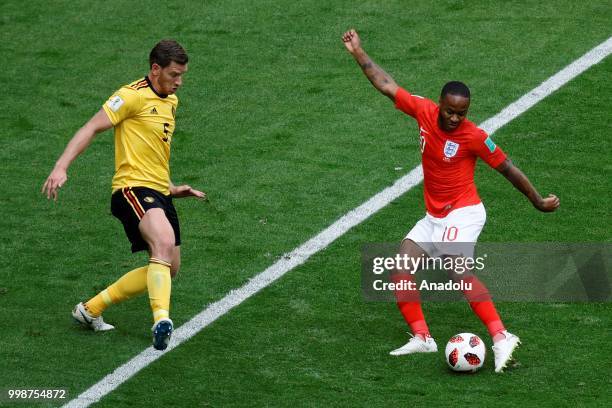 Jan Vertonghen of Belgium and Raheem Sterling of England vie for the ball during the 2018 FIFA World Cup 3rd place match between Belgium and England...