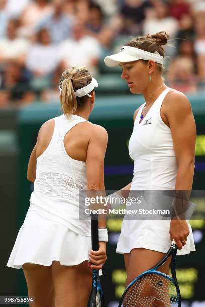 Nicole Melichar of The United States and Kveta Peschke of Czech Republic discuss tactics during the Ladies' Doubles final against Barbora Krejcikova...
