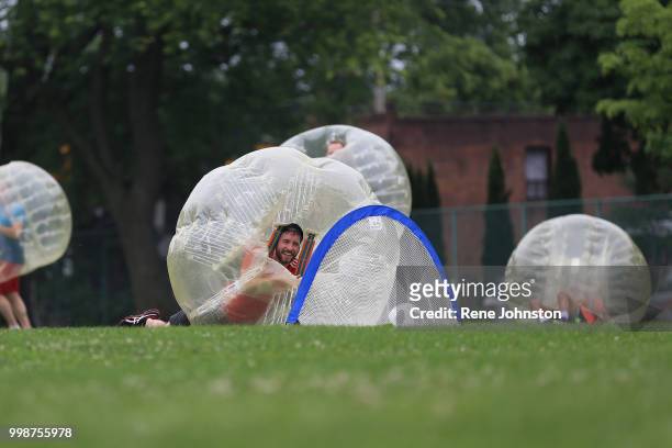 Blair Parsons smiles from the bubble hole after he scored a goal. A group of friends gathered at D.A .Morrison Middle school field to play bubble...