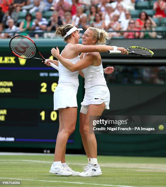 Barbora Krejcikova and Katerina Siniakova celebrate winning the Ladies' doubles final on day twelve of the Wimbledon Championships at the All England...