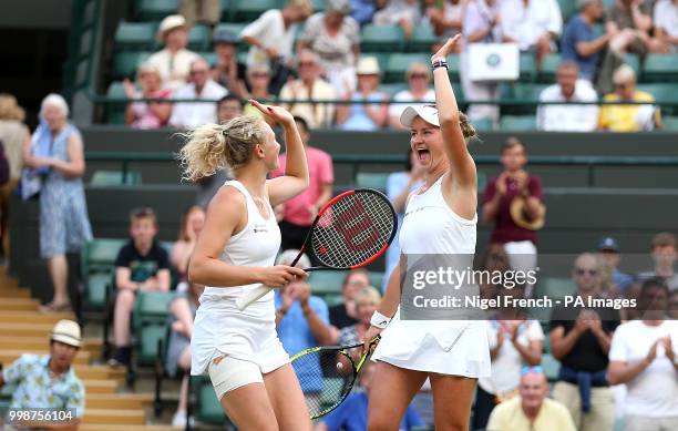 Katerina Siniakova and Barbora Krejcikova celebrate winning the Ladies' doubles final on day twelve of the Wimbledon Championships at the All England...
