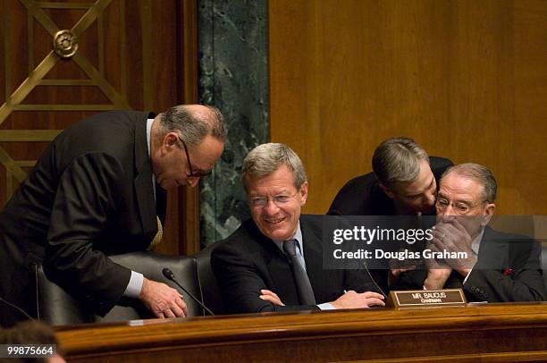 Charles Schumer, D-NY., Chairman Max Baucus, D-MT., Health Policy Director and Chief Health Counsel, Mark Hayes and Charles Grassley, R-IA., talk...