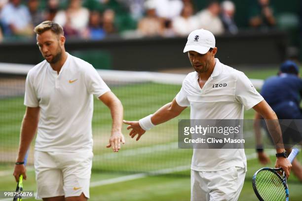 Mike Bryan and Jack Sock of The United States celebrate a point against Raven Klaasen of South Africa and Michael Venus of New Zealand during the...