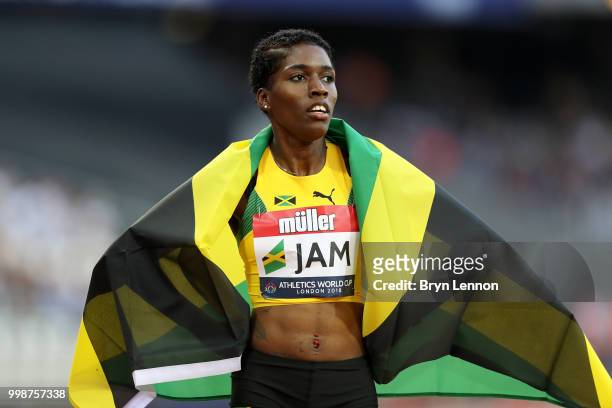 Janieve Russell of Jamaica celebrates winning the Women's 400m Hurdles during day one of the Athletics World Cup London at the London Stadium on July...