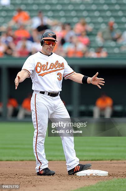 Luke Scott of the Baltimore Orioles reacts after hitting a double against the Cleveland Indians at Camden Yards on May 16, 2010 in Baltimore,...