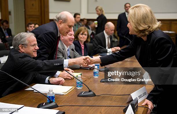 Oliver Ireland, partner at Morrison & Foerster greets Carolyn Maloney, D-NY, during the House Financial Services Committee full committee hearing on...