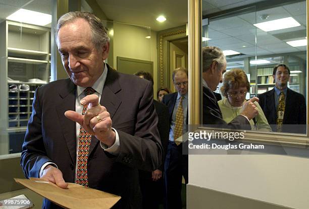 Tom Harkin, D-IA., talks with reporters before the press conference on an amendment to preserve overtime pay protections for millions of American...