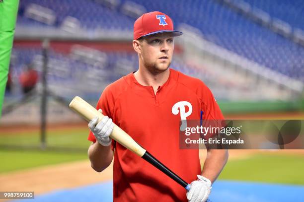 Rhys Hoskins of the Philadelphia Phillies looks on during batting practice before the start of the game against the Miami Marlins at Marlins Park on...