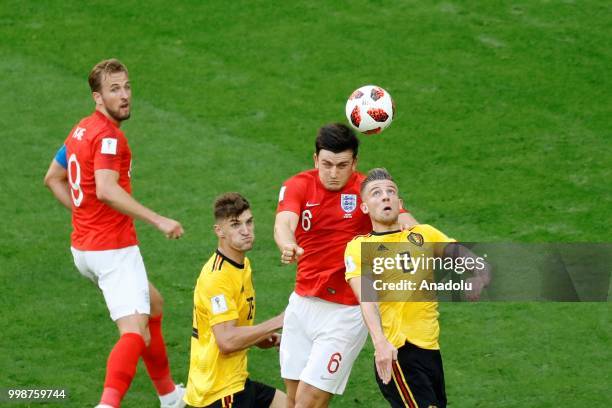 Toby Alderweireld of Belgium and Harry Maguire of England vie for the ball during the 2018 FIFA World Cup 3rd place match between Belgium and England...