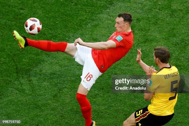 Phil Jones of England and Jan Vertonghen of Belgium vie for the ball during the 2018 FIFA World Cup 3rd place match between Belgium and England at...