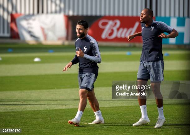 France's national football team player Nabil Fekir and Djibril Sidibe are seen during training session ahead of the World Cup 2018 final match...
