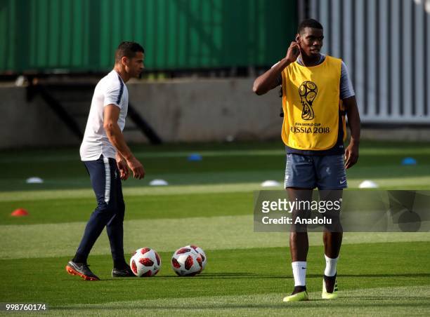 France's national football team player Paul Pogba is seen during training session ahead of the World Cup 2018 final match against Croatia, in Moscow,...