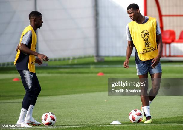 France's national football team player Paul Pogba is seen during training session ahead of the World Cup 2018 final match against Croatia, in Moscow,...