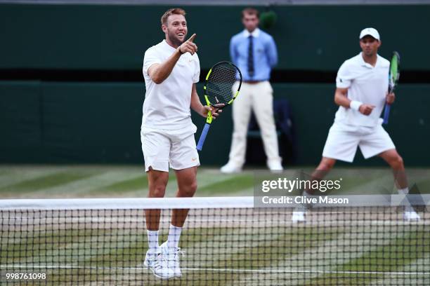 Jack Sock of The United States reacts during his Men's Doubles final against Raven Klaasen of South Africa and Michael Venus of New Zealand on day...