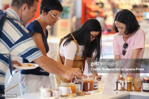 People testing confitures at the Jam Festival at FICO Agri-Food Park on July 14, 2018 in Bologna, Italy.