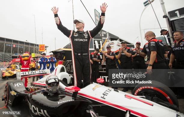 Josef Newgarden exits his car after grabbing the poll position at qualifying. Qualifying session for Honda Indy cars for poll positions for Sunday's...