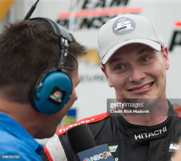 Josef Newgarden makes a face during a TV interview after grabbing the poll position at qualifying. Qualifying session for Honda Indy cars for poll...