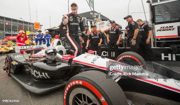 Josef Newgarden exits his car after grabbing the poll position at qualifying. Qualifying session for Honda Indy cars for poll positions for Sunday's...