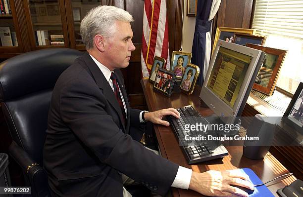 Mike Pence, R-IN., works on his computer in his office in the Longworth House Office Building.