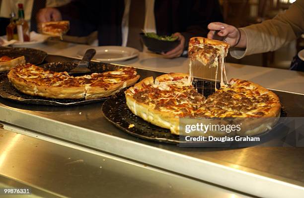 The lunch crowd digs in at Armond's Pizza in Washington D.C.