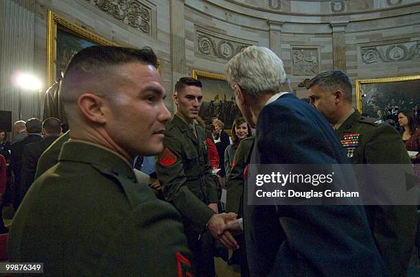 John Warner, R-VA., greets marines during the Congressional Remembrance Ceremony on Thursday, March 13, 2008 to honor the five years of service and...