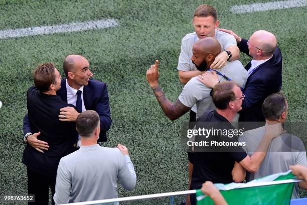 The staff with Roberto Martinez, manager of the Belgium national football team and Thierry Henry ass. Coach of Belgian Team celebrating after winning...