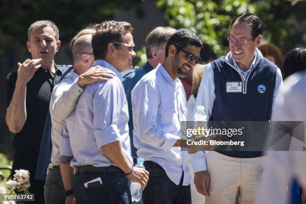 Bob Iger, chief executive officer of The Walt Disney Co., from left, Lachlan Murdoch, co-chairman of Twenty-First Century Fox Inc., Sundar Pichai,...