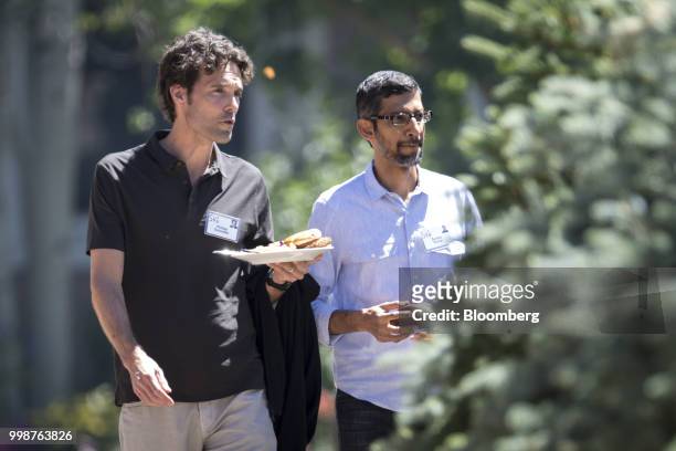 Philipp Schindler, senior vice president and chief business officer at Google Inc., left, and Sundar Pichai, chief executive officer of Google Inc.,...
