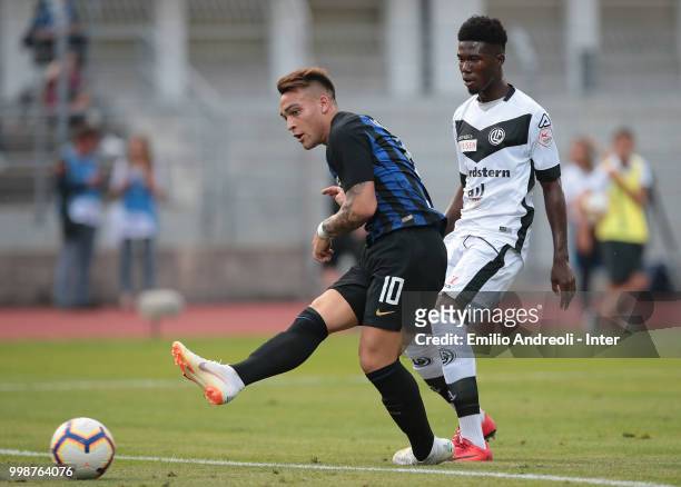 Lautaro Martinez of FC Internazionale scores the opening goal during the pre-season friendly match between Lugano and FC Internazionale on July 14,...