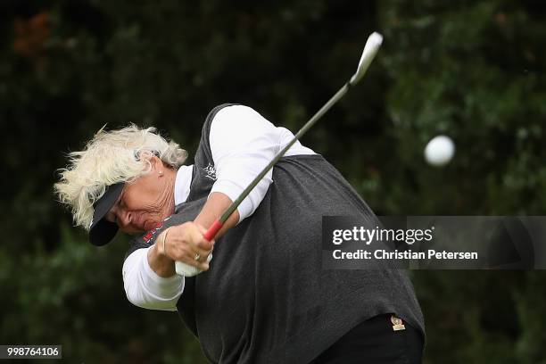 Laura Davies of England plays a tee shot on the 15th hole during the third round of the U.S. Senior Women's Open at Chicago Golf Club on July 14,...
