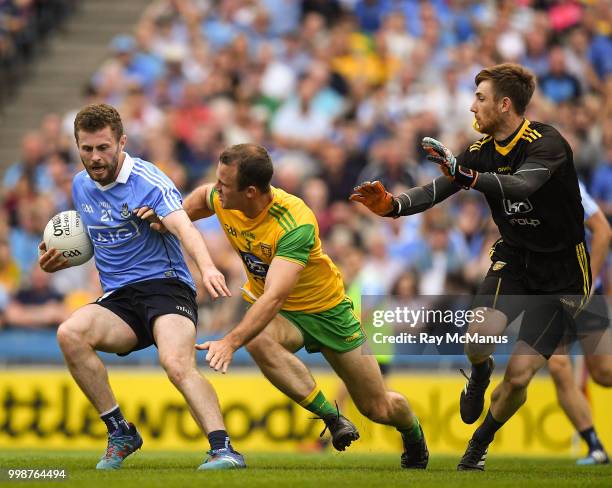 Dublin , Ireland - 14 July 2018; Jack McCaffrey of Dublin in action against Neil McGee and goalkeeper Shaun Patton of Donegal during the GAA Football...