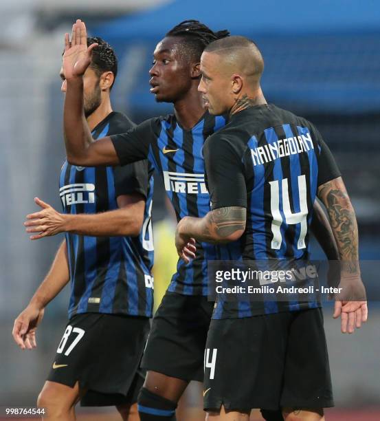 Yann Karamoh of FC Internazionale celebrates his goal with his teammates during the pre-season friendly match between Lugano and FC Internazionale on...