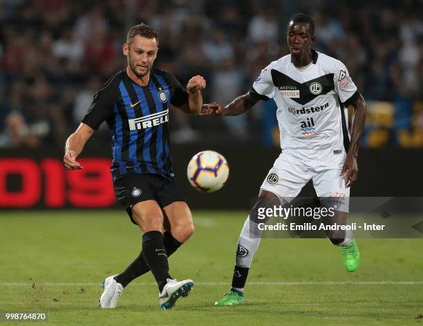Stefan De Vrij of FC Internazionale controls the ball during the pre-season friendly match between Lugano and FC Internazionale on July 14, 2018 in...