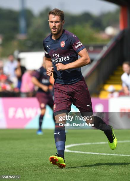 Aaron Ramsey of Arsenal during the match between Borehamwood and Arsenal at Meadow Park on July 14, 2018 in Borehamwood, England.