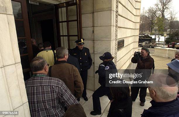 Staffers and public prepare to enter the Russell Senate Office Building after the building was declared safe after the ricin scare.