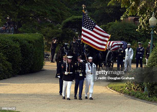 The 3rd Infantry Division Old Guard brings former President Ronald Reagan's casket on horse-drawn caisson to his State Funeral in the Rotunda of the...