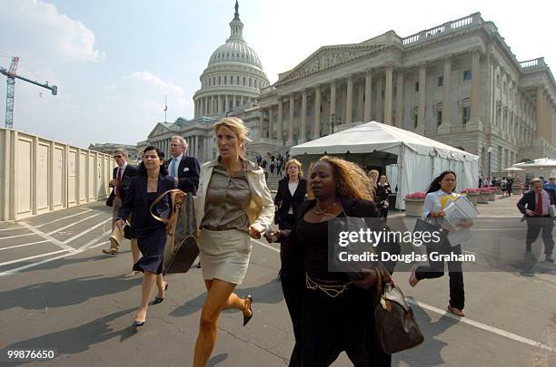 Visitors and staff evacuate the Capitol on Wednesday afternoon. The warning lasted only a few minutes before the Capitol Police announced it was a...