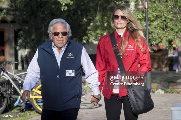 Robert Kraft, chief executive officer and founder of Kraft Group, left, and Ricki Lander arrive for the morning session at the Allen & Co. Media and...