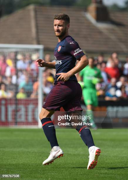 Shkodran Mustafi of Arsenal runs during the match between Borehamwood and Arsenal at Meadow Park on July 14, 2018 in Borehamwood, England.