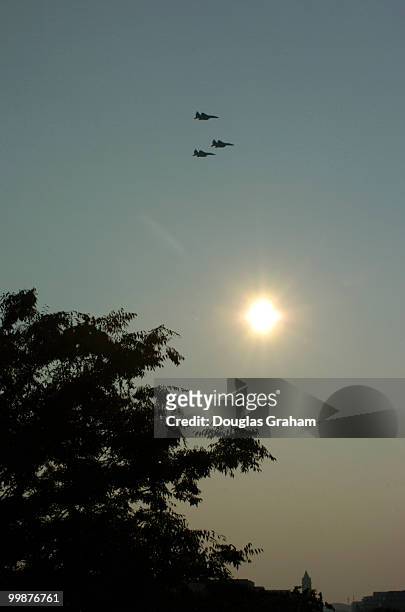 Flyover of 21 F-15's passed over the U.S. Capitol and the 3rd Infantry Division Old Guard as former President Ronald Reagan's casket sits on a...