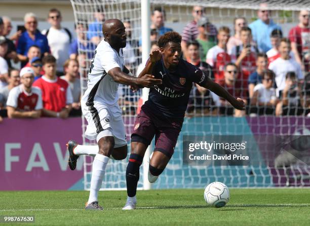 Jeff Reine-Adelaide of Arsenal controls the ball during the match between Borehamwood and Arsenal at Meadow Park on July 14, 2018 in Borehamwood,...